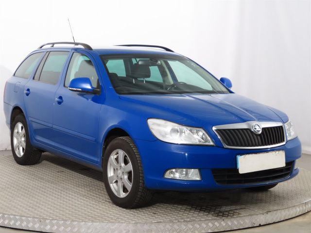 Náhled produktu - Podélný střešní nosič Škoda Octavia II Combi ORIGINÁL